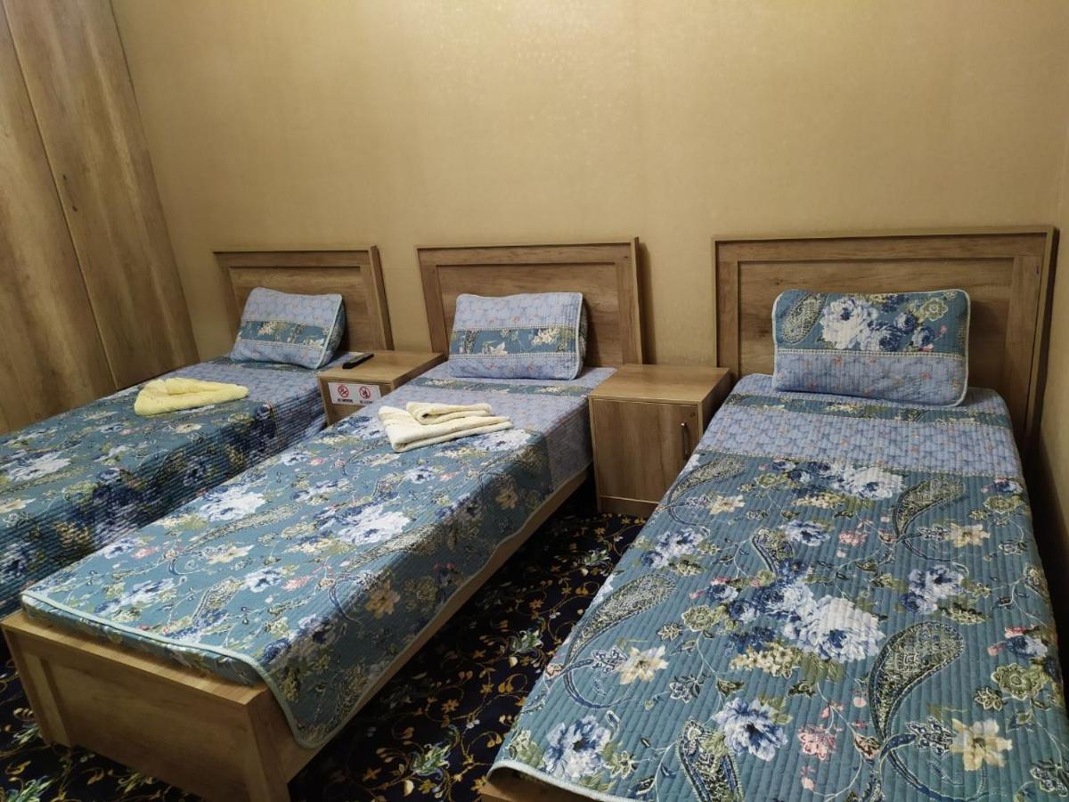 Uvaysiy Family Guest House Marghilon Kültér fotó